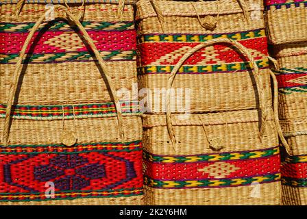 Chilean woven straw duffle bags on display for sale in an outdoor store in Chile Stock Photo