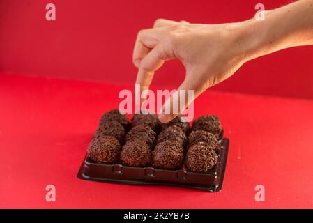 The chocolate truffle is a sweet with an appearance and taste similar to the bonbon Stock Photo