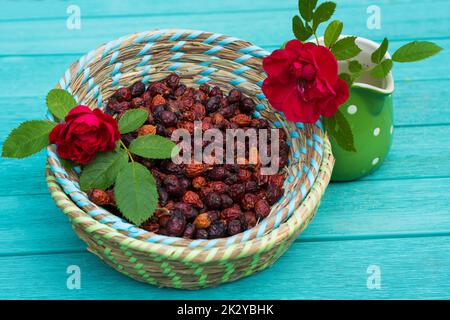 Many rose hips in a basket Stock Photo