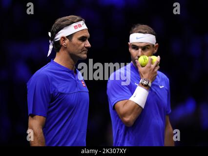 Team Europe's Roger Federer (left) and Rafael Nadal during their match against Team World's Jack Sock and Frances Tiafoe on day one of the Laver Cup at the O2 Arena, London. Picture date: Friday September 23, 2022. Stock Photo