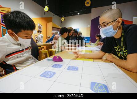 Vancouver, Canada. 23rd Sep, 2022. A child learns to code the movement of a robot during the Tech-Up Showcase event at Science World in Vancouver, Canada, on Sept. 23, 2022. Credit: Liang Sen/Xinhua/Alamy Live News Stock Photo