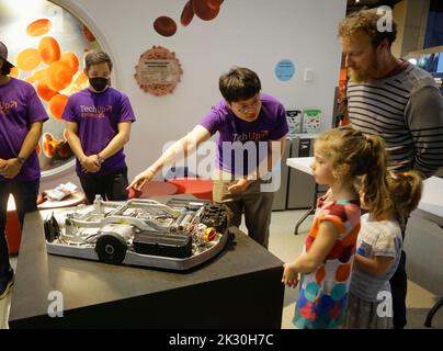 Vancouver, Canada. 23rd Sep, 2022. Children look at a robot during the Tech-Up Showcase event at Science World in Vancouver, Canada, on Sept. 23, 2022. Credit: Liang Sen/Xinhua/Alamy Live News Stock Photo
