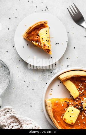 Studio shot of freshly baked butternut squash pie with sesame seeds Stock Photo