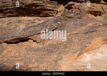 Nabataean script on rockface slot canyon near Al Ula Saudi Arabia Stock Photo