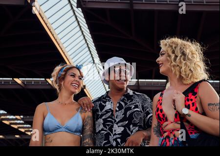 Happy young man having fun with friends Stock Photo