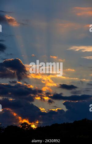 Clouds illuminated by setting sun Stock Photo