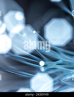 Illuminated optical fibers with lens flares Stock Photo
