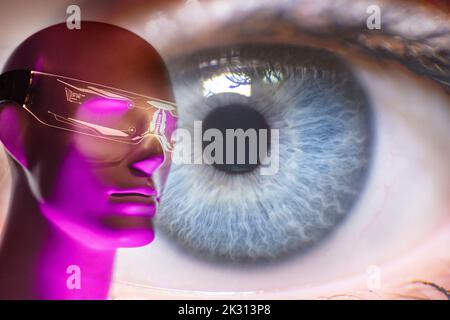 Robot wearing futuristic eyeglasses in front of gray eye Stock Photo