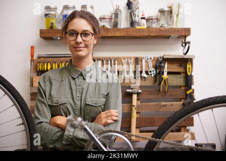 Im the expert around here. an attractive young woman looking at the camera. Stock Photo