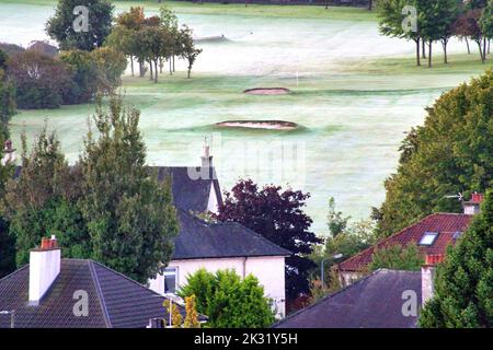 Glasgow, Scotland, UK 24th September,  2022. UK Weather: First frost of the autumn saw the greens of knightswood golf course turn white as summer becomes a memory. Credit Gerard Ferry/Alamy Live News Stock Photo