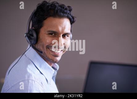 Hes ready for whatever the business world throws at him. a handsome young businessman in his office. Stock Photo
