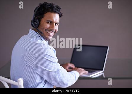 Hes ready for whatever the business world throws at him. a handsome young businessman in his office. Stock Photo