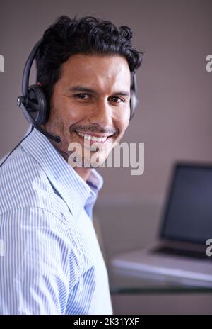 Hes ready for whatever the business world throws at him. a handsome young businessman in his office. Stock Photo