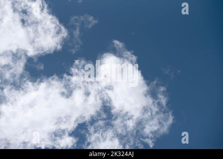 blurred white clouds in blue sky Stock Photo