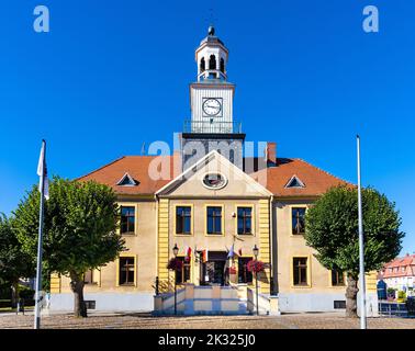 Trzebiatow, Poland - August 11, 2022: Classicist Ratusz town hall palace at Rynek main market square in historic old town quarter of Trzebiatow Stock Photo