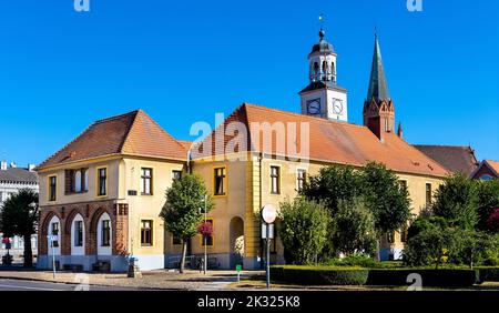 Trzebiatow, Poland - August 11, 2022: Classicist Ratusz town hall palace at Rynek main market square in historic old town quarter of Trzebiatow Stock Photo