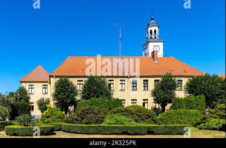 Trzebiatow, Poland - August 11, 2022: Classicist Ratusz town hall palace at Rynek main market square in historic old town quarter of Trzebiatow Stock Photo