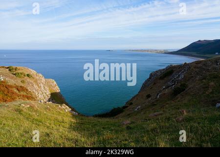 Across the wide expanse of Rhossili Bay from high up on the grass covered cliff tops. Stock Photo