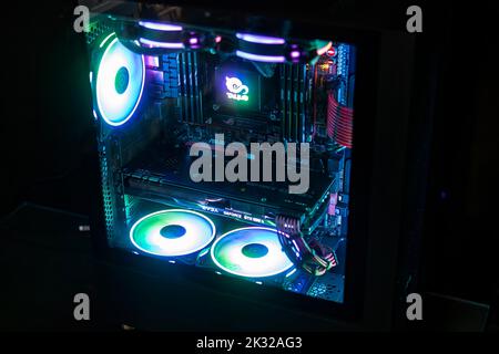 Los Angeles, United States 24 september 2022: Gaming workstation battle station custom pc building rgb illuminated computer setup interior Stock Photo
