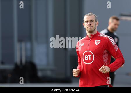 Cardiff, UK. 24th Sep, 2022. Gareth Bale of Wales during the Wales football team MD1 training session at the Vale Resort, Hensol, near Cardiff on Saturday 24th September 2022. The team are preparing for their next match, a UEFA Nations league match against Poland tomorrow . this image may only be used for Editorial purposes. Editorial use only, pic by Andrew Orchard/Andrew Orchard sports photography/Alamy Live news Credit: Andrew Orchard sports photography/Alamy Live News