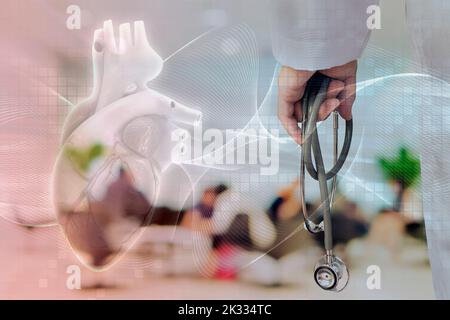 Doctor is going to examine his patient using his stethoscope over sitting people in modern hospital background Stock Photo