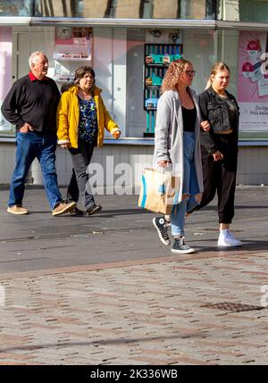 Dundee, Tayside, Scotland, UK. 24th Sep, 2022. UK Weather: A bright and cool Autumn weekend, with temperatures reaching 15°C in some parts of Northeast Scotland. Local trendy women are out and about enjoying the late September weather while shopping in Dundee city centre, although somewhat conservatively due to the high cost of living. Credit: Dundee Photographics/Alamy Live News Stock Photo