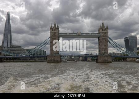 View from a boat back to Tower Bridge and the tallest building, The Shard Stock Photo