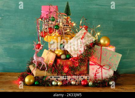 Christmas gifts, gift wrap,decoration,lights, christmas baubles and tinsel Stock Photo