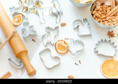molds for Christmas gingerbread in the form of animals on a white table Stock Photo