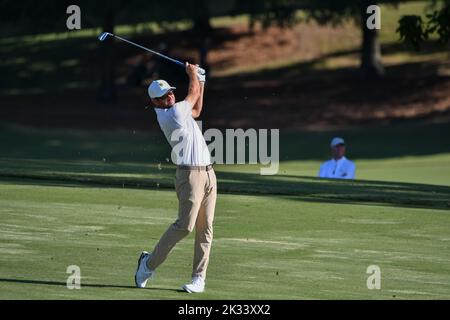 Corey Conners hits from a fairway bunker on the 11th hole during the ...