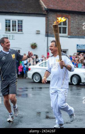 Raymond Blanc carried the torch through Wallingford Olympic Torch Procession, July 10th 2012 Stock Photo