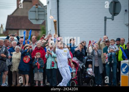 Raymond Blanc carried the torch through Wallingford Olympic Torch Procession, July 10th 2012 Stock Photo