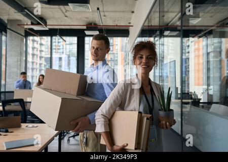Group of corporate workers involved in office relocation Stock Photo