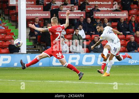 Walsall, UK. 24th Sep, 2022. Kane Hemmings of Tranmere Rovers (r) shoots but sees his effort saved. EFL Skybet Football league two match, Walsall v Tranmere Rovers at the Poundland Bescot Stadium in Walsall, West Midlands on Saturday 24th September 2022. this image may only be used for Editorial purposes. Editorial use only, license required for commercial use. No use in betting, games or a single club/league/player publications.pic by Chris Stading/Andrew Orchard sports photography/Alamy Live News Credit: Andrew Orchard sports photography/Alamy Live News
