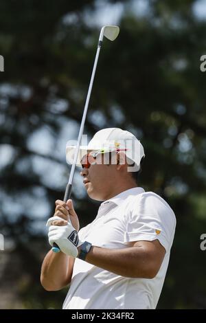 Hideki Matsuyama, of Japan, watches his shot on the 17th green during ...