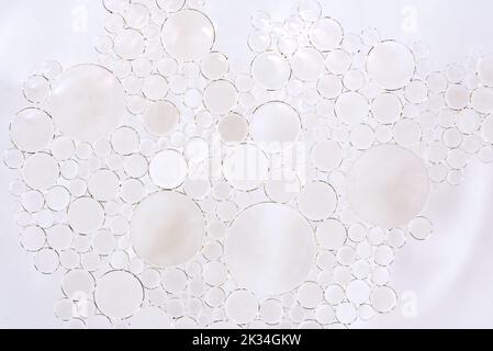 Background from white bubbles in water or oil close up. bubbles Stock Photo