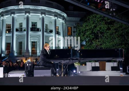 Washington, United States Of America. 23rd Sep, 2022. Washington, United States of America. 23 September, 2022. Musical legend Elton John performs during “A Night When Hope and History Rhyme”, on the South Lawn of the White House, September 23, 2022 in Washington, DC John was later surprised when U.S. President Joe Biden presented him with the National Humanities Medal. Credit: Adam Schultz/White House Photo/Alamy Live News Stock Photo
