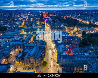 Edinburgh, Scotland, UK. 24th September 2022. Aerial view at night of the Royal Mile two weeks after Queen Elizabeth II lay inside St Giles Cathedral and thousands of people lined the street. The Royal Mile is now back to normal and still busy with the usual heavy influx of tourists.  Iain Masterton/Alamy Live News Stock Photo