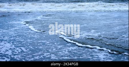 Blue Sea waves flowing on ocean floor. Full frame. Nature background. Stock Photo