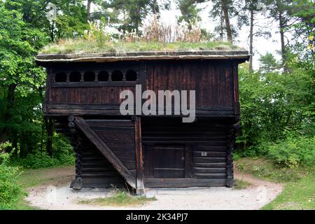 Oslo, Norway, September 2022: Old wooden storehouse from Rolstad exhibited at The Norwegian Museum of Cultural History (Norsk Folkemuseum) Stock Photo