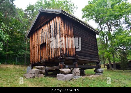 Oslo, Norway, September 2022: Old wooden house with grass roof exhibited at The Norwegian Museum of Cultural History (Norsk Folkemuseum) Stock Photo