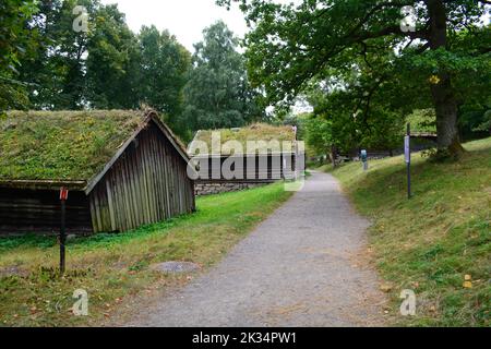 Oslo, Norway, September 2022: Old wooden houses with grass roofs exhibited at The Norwegian Museum of Cultural History (Norsk Folkemuseum) Stock Photo