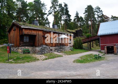 Oslo, Norway, September 2022: Old wooden house with grass roof exhibited at The Norwegian Museum of Cultural History (Norsk Folkemuseum) Stock Photo