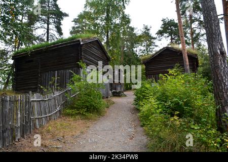 Oslo, Norway, September 2022: Old wooden houses with grass roofs exhibited at The Norwegian Museum of Cultural History (Norsk Folkemuseum) Stock Photo