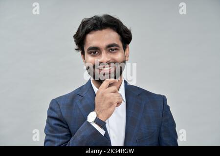 Happy young indian arab business man wearing suit. Headshot portrait Stock Photo