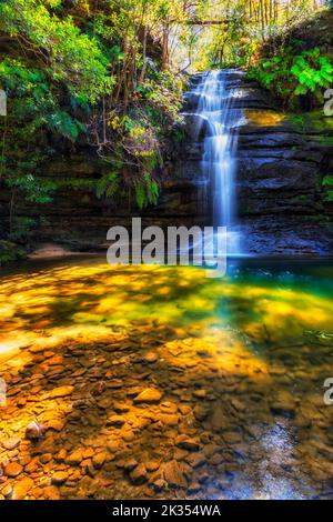 Gordon Falls in Blue Mountains national park streaming to pool of Siloam - walking tracks of Leura mountain town. Stock Photo