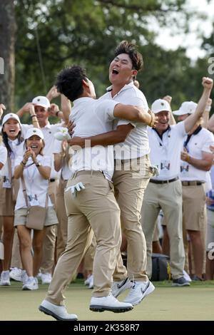 Si Woo Kim of South Korea reacts to his putt on the 18th green during