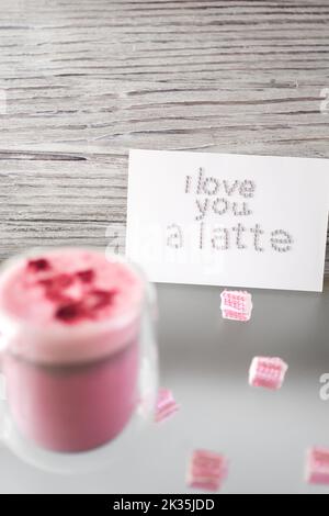 Double-walled glass thermocup with beetroot latte, pink latte is a fashionable and relevant alternative to coffee. giving up caffeine in favor of a he Stock Photo