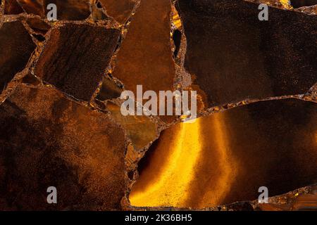 Tiger Eye Golden. Semi precious matt mineral pattern. Polished semiprecious stone for ceramic wall and floor digital tiles. Material for unique Stock Photo