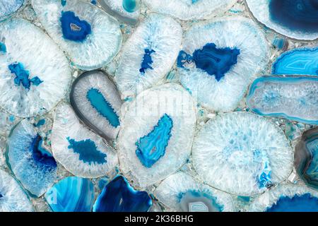 Sample of blue mosaic made of pieces of natural agate collected in manual handing. Polished semiprecious stone for ceramic wall and floor digital Stock Photo